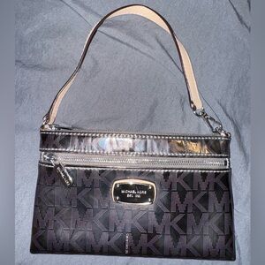 Michael Kors silver shiny wristlet/mini arm bag